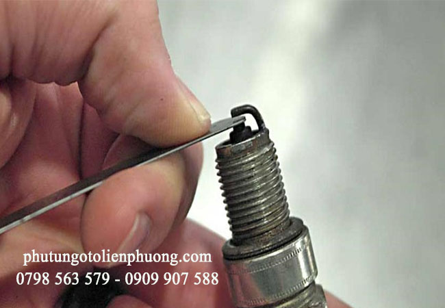 thay bugi xe ô tô thay bugi xe ô tô