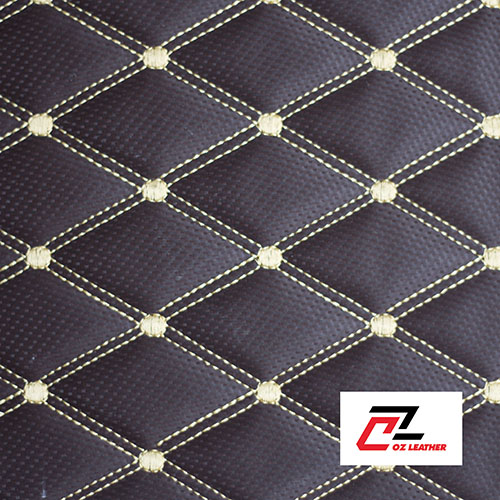 Vật liệu lót sàn Da PVC hình thoi cacbon nâu chỉ vàng 2 đường chỉ. Vật liệu lót sàn Da PVC hình thoi cacbon nâu chỉ vàng 2 đường chỉ.
