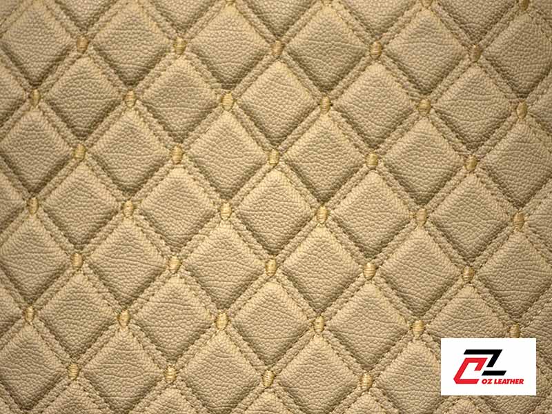 Vật liệu lót sàn 5D Da PVC hình vuông sần kem chỉ vàng 2 đường chỉ kem Vật liệu lót sàn 5D Da PVC hình vuông sần kem chỉ vàng 2 đường chỉ kem