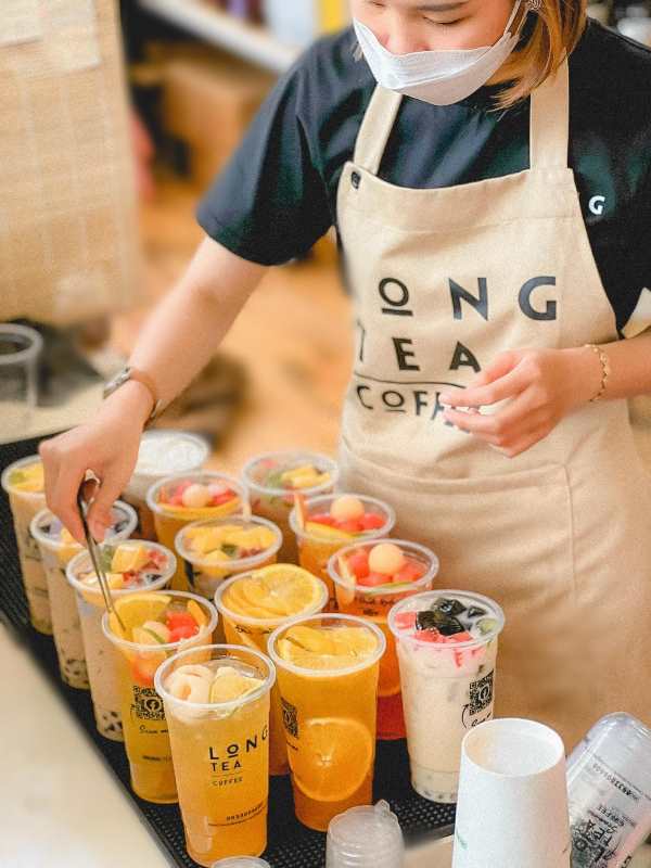 Mẫu đồng phục tạp dề của nhân viên tại Long Tea & Coffee - Hình 1