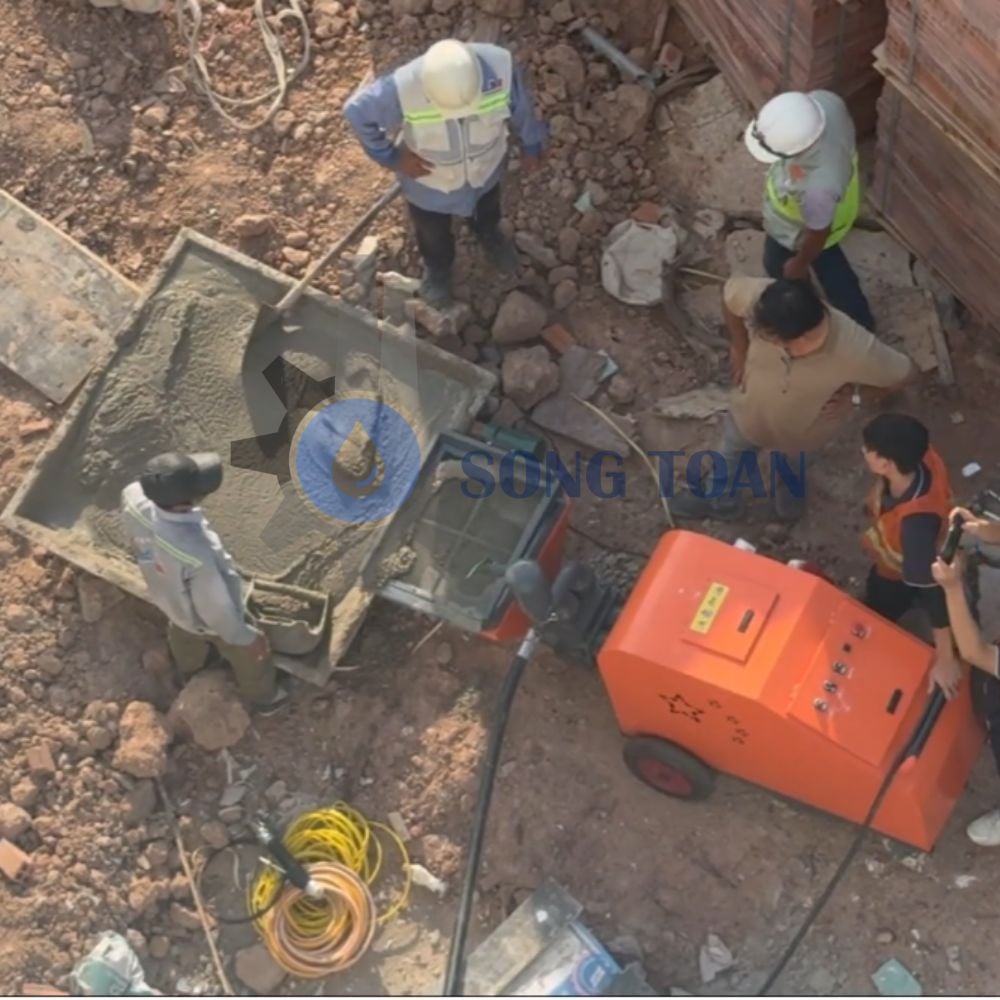 BÀN GIAO MÁY PHUN VỮA PISTON ST-5011: GIẢI PHÁP THI CÔNG TOÀN DIỆN CHO CÔNG TRÌNH LỚN
