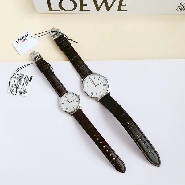 Cặp đôi TISSOT T063.409.16.018.00 T063.209.16.038.00