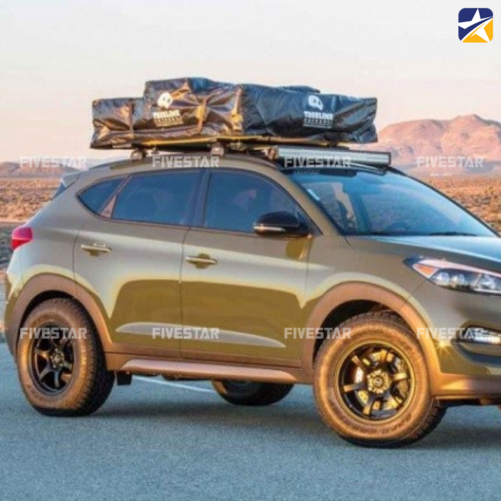 Dùng bạt phủ để bảo vệ hàng hóa trên nóc ôtô khỏi thời tiết Dùng bạt phủ để bảo vệ hàng hóa trên nóc ôtô khỏi thời tiết