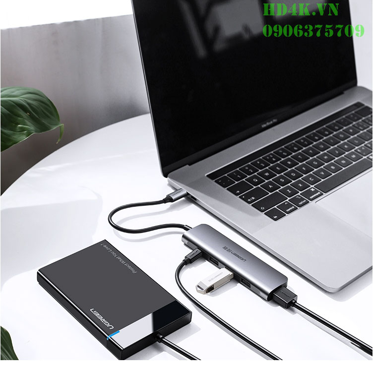 Bộ chia USB Type C ra 4 cổng USB 3.0 + USB-C cấp nguồn Ugreen 50980 Bộ chia USB Type C ra 4 cổng USB 3.0 hỗ trợ cổng USB-C cấp nguồn Ugreen 50980