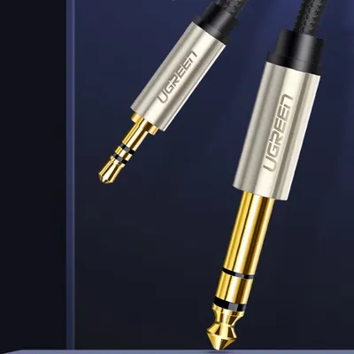 Cáp âm thanh 3.5mm to 6.5mm dài 3m Ugreen 40805
