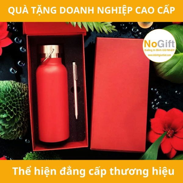 Bình giữ nhiệt in logo quai xách màu đỏ kèm bút bi inox Bình giữ nhiệt in logo quai xách màu đỏ kèm bút bi inox