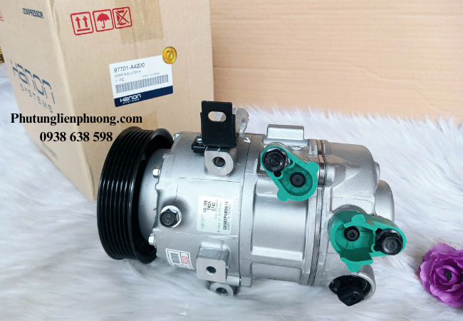 Lốc lạnh Kia Carens có nhiệm vụ nén chất làm mát (gas) để tạo ra áp suất cao Lốc lạnh Kia Carens có nhiệm vụ nén chất làm mát (gas) để tạo ra áp suất cao