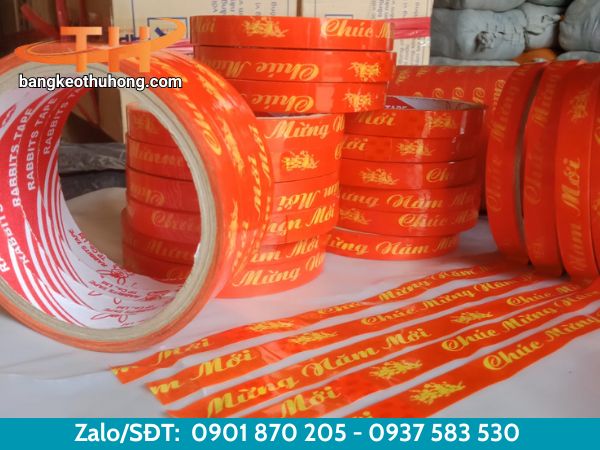 Băng keo chúc mừng năm mới nền đỏ chữ vàng Băng keo chúc mừng năm mới nền đỏ chữ vàng