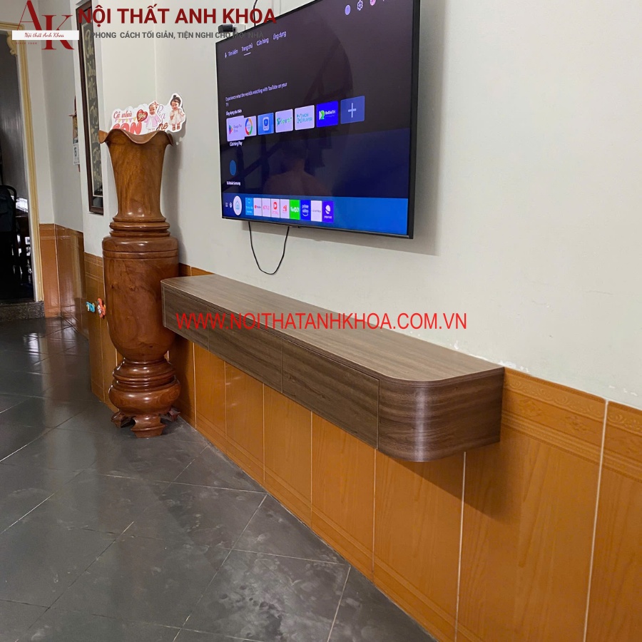 Kệ tivi treo tường bo góc gỗ MDF màu vân gỗ Kệ tivi treo tường bo góc gỗ MDF màu vân gỗ