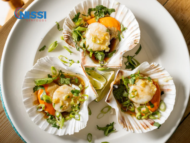 មឹកខ្យងចំហុយក្នុងសំបកជាមួយខ្ញី មឹកខ្យងចំហុយក្នុងសំបកជាមួយខ្ញី