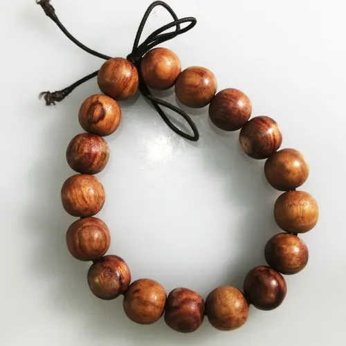 Vòng tay phong thủy gỗ sưa thiên nhiên 12 ly