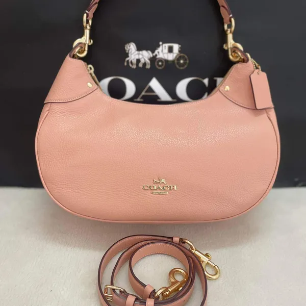Túi xách Coach màu hồng
