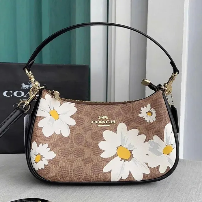 Túi Coach vợt sale có sẵn