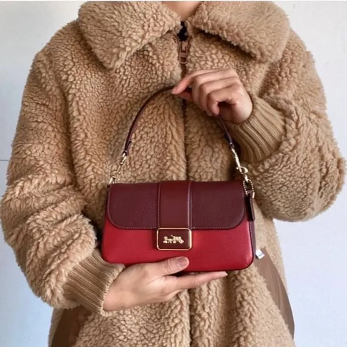 Túi coach kẹp nách đeo chéo