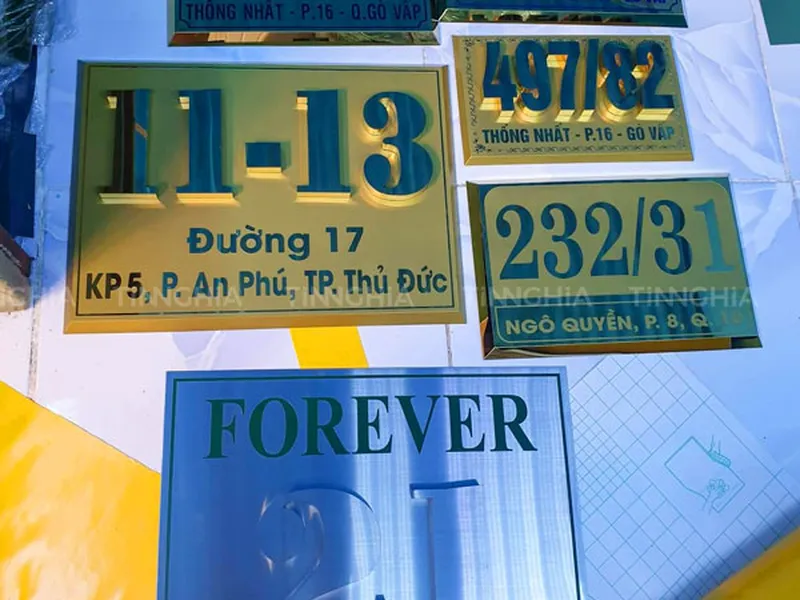 BIỂN HIỆU INOX ĂN MÒN DĨ AN