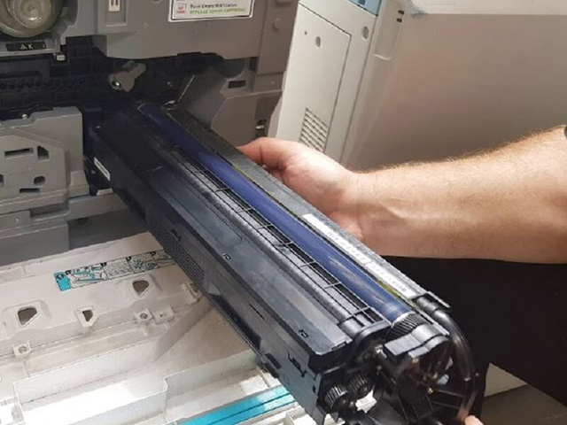 máy photocopy bị lem mực