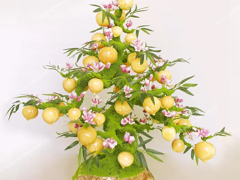 Khi Đá Biết “Nở Hoa”: Câu Chuyện Nghệ Nhân Và Cây Đào Ngọc Hoàng Long