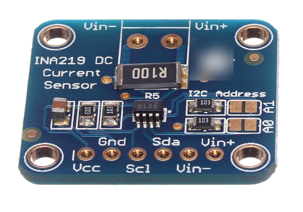 Module INA219 màu xanh có điện trở shunt ghi R100, chip INA219, các chân Vcc, Gnd, Scl, Sda, Vin+, Vin- và hai lỗ cọc vít Vin+, Vin-