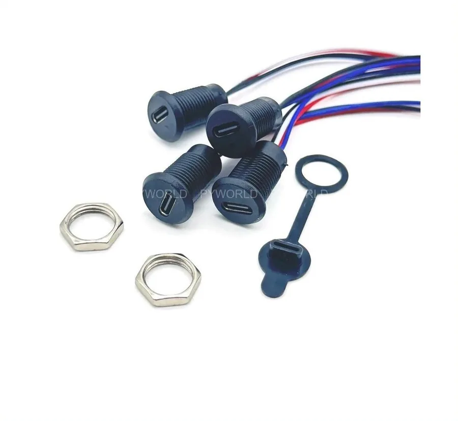 Bốn jack Type-C tròn màu đen thân có ren, kèm hai đai ốc và nắp che cao su
