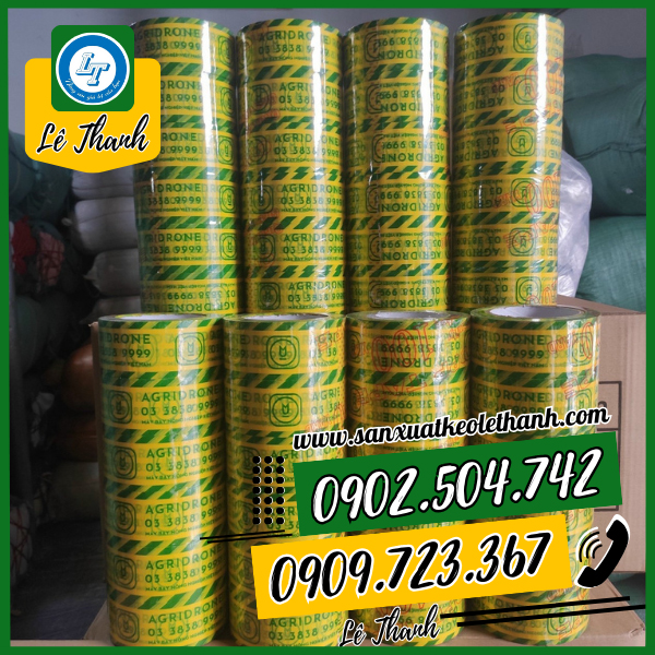 Băng keo in logo nền xanh chữ vàng Băng keo in logo nền xanh chữ vàng