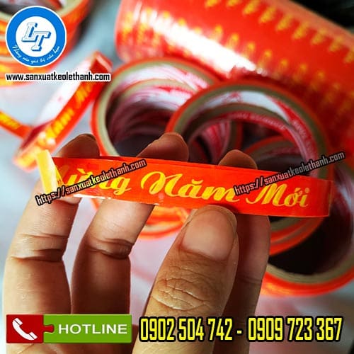 Cuộn băng keo chúc mừng năm mới nền đỏ 1f2