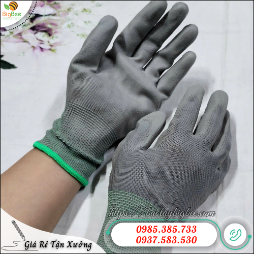Găng tay phủ PU lòng bàn tay xám cho nhà máy, xưởng sản xuất. Găng tay phủ PU lòng bàn tay xám cho nhà máy, xưởng sản xuất.