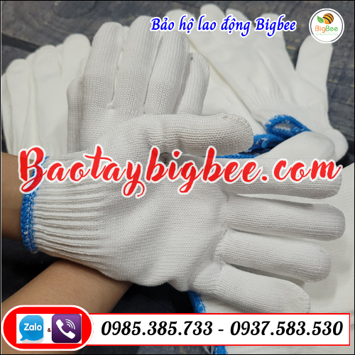 Găng tay len bảo hộ sợi poly trắng. Găng tay len bảo hộ sợi poly trắng.