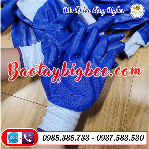 Bao tay sợi phủ sơn xanh. Bao tay sợi phủ sơn xanh.