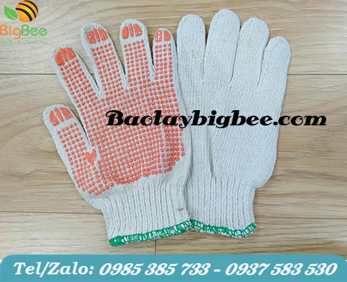 Bao tay len cotton phủ hạt nhựa màu cam. Bao tay len cotton phủ hạt nhựa màu cam.