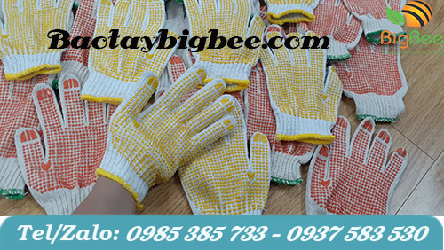 Bao tay len cotton phủ hạt nhựa màu vàng. Bao tay len cotton phủ hạt nhựa màu vàng.