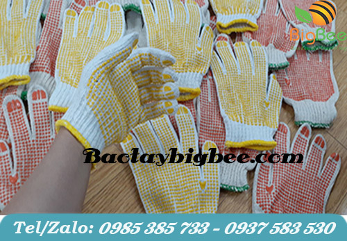 Găng tay len phủ hạt nhựa vàng. Găng tay len phủ hạt nhựa vàng.