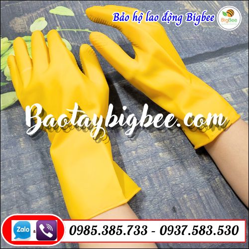 Găng tay cao su chống thấm màu vàng. Găng tay cao su chống thấm màu vàng.