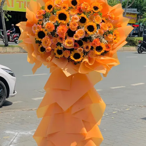 KỆ HOA CHÚC MỪNG KHAI TRƯƠNG TONE VÀNG CAM - KCM004