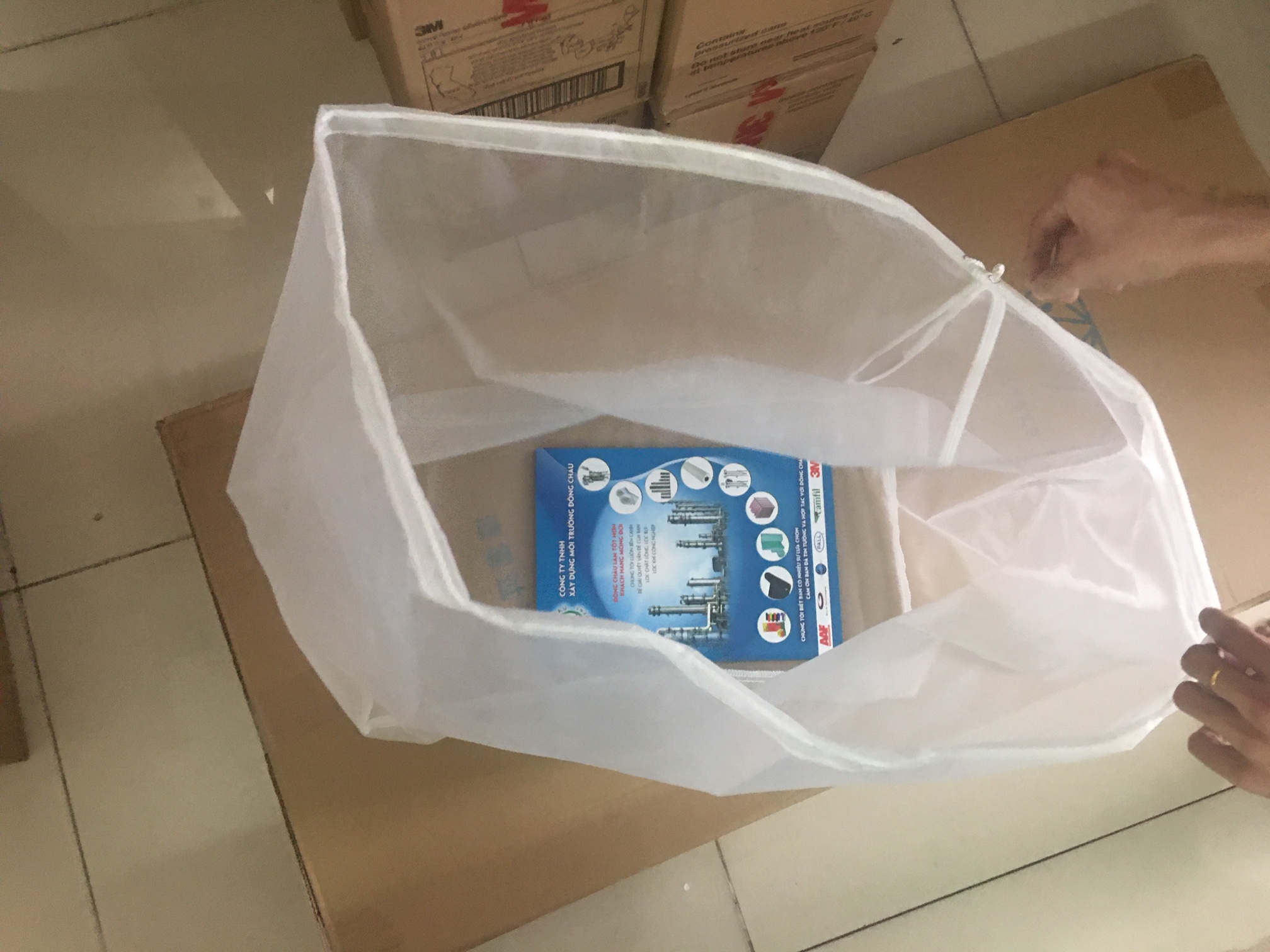 Túi lọc nước nuôi thủy sản, túi lọc hóa chất, túi lọc sữa miệng dây rút Túi NMO lọc nước thủy sản