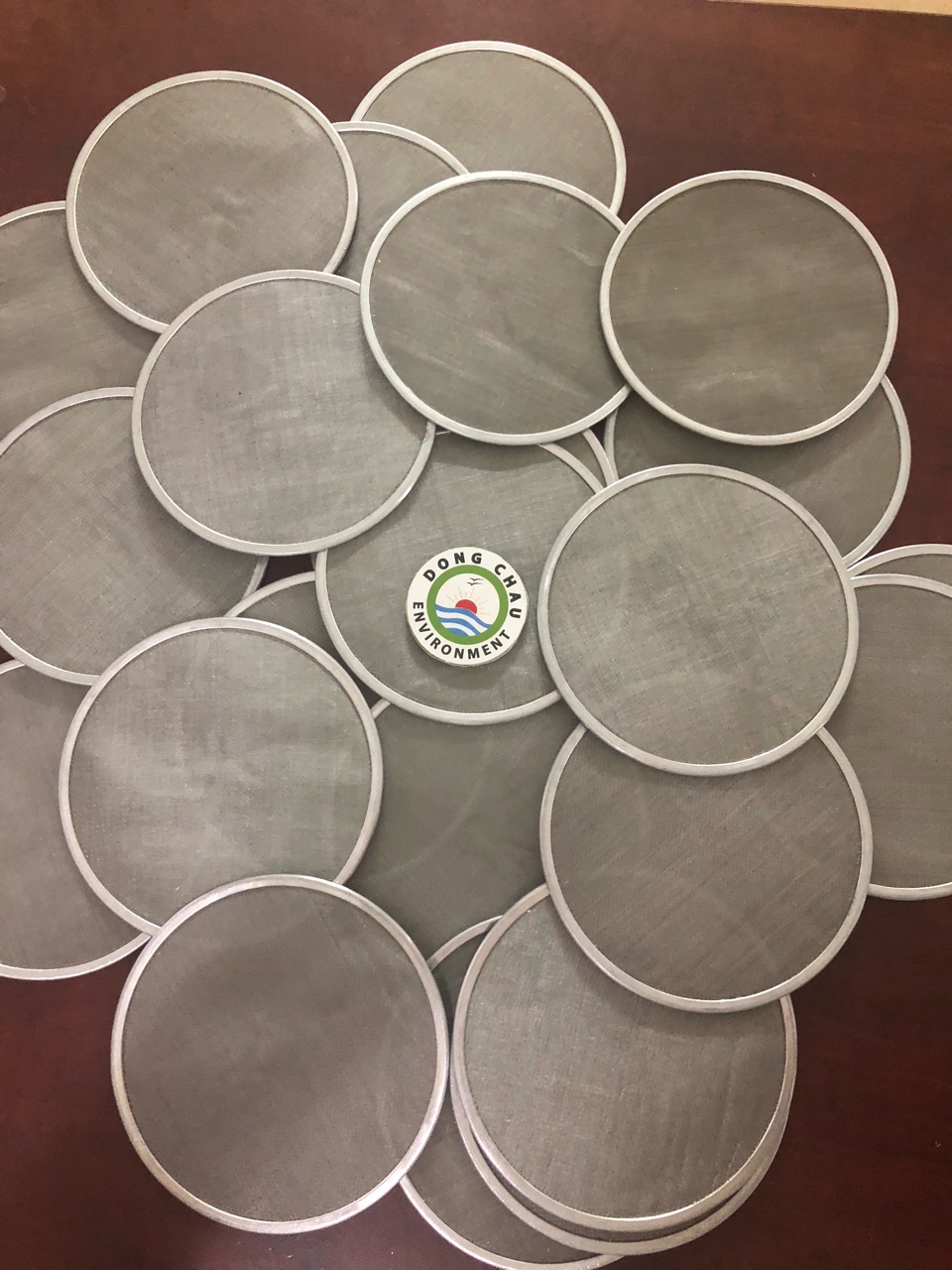 mieng-loc-inox-tron đóng gói Miếng inox tròn nhiều lớp có bọc viền