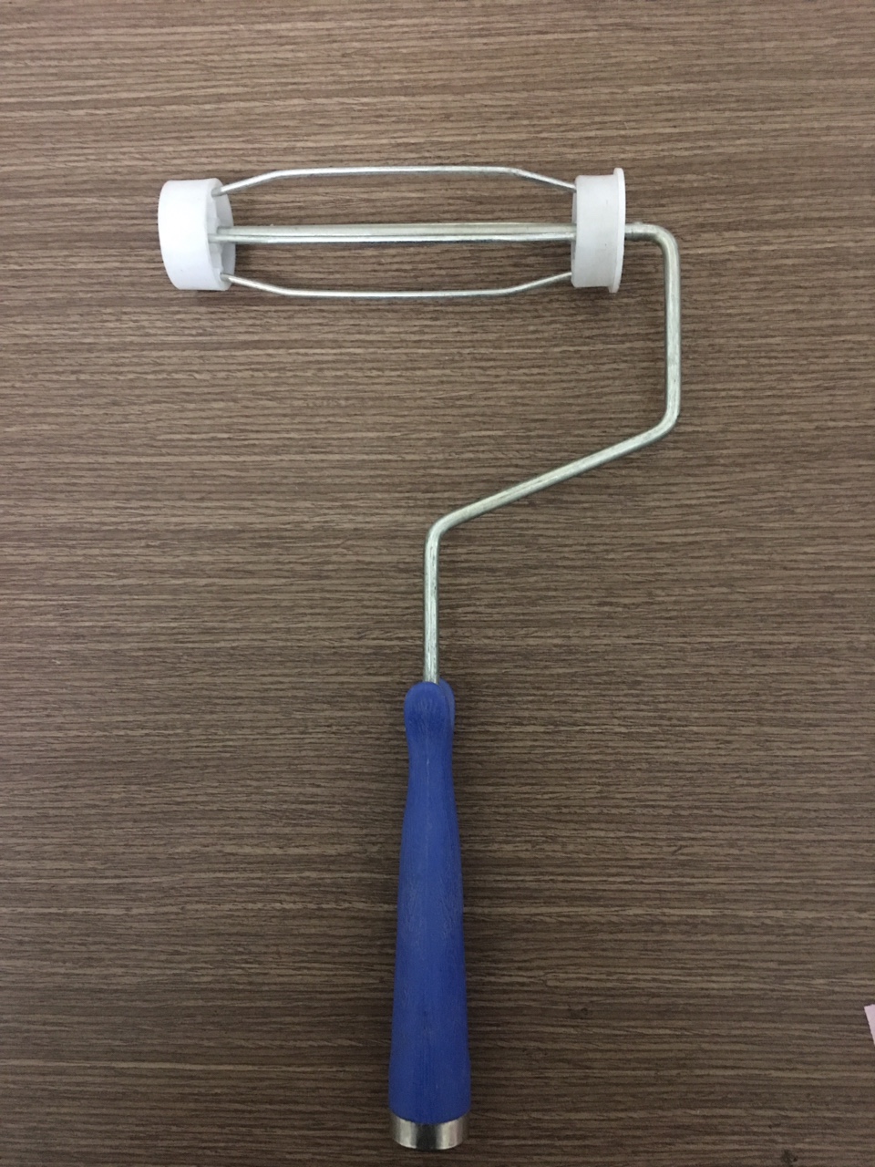 tay-cam-con-lan Con lăn dính bụi phòng sạch màu trắng