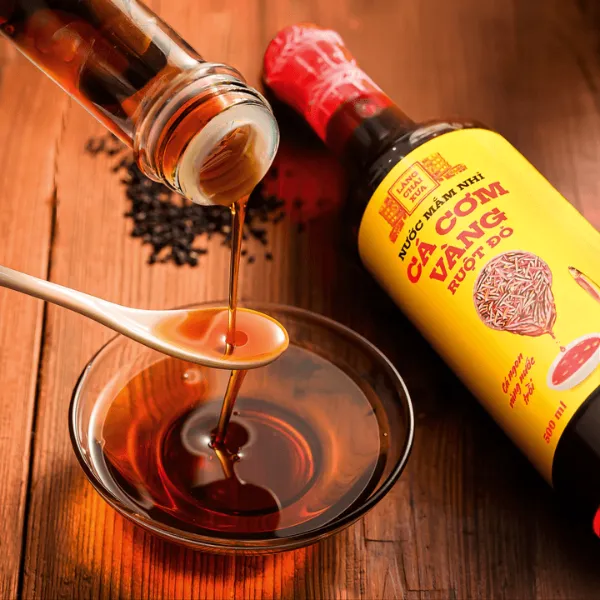 Nước Mắm Nhỉ Cá Cơm Vàng Ruột Đỏ 500ml Chai Thủy Tinh