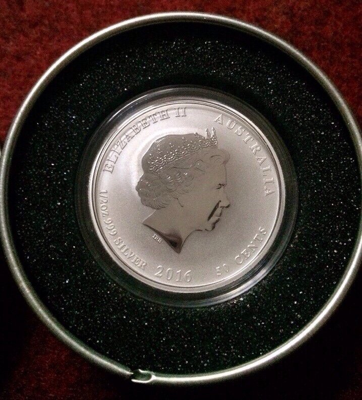 Đồng xu bạc hình con khỉ Đồng xu bạc hình con khỉ