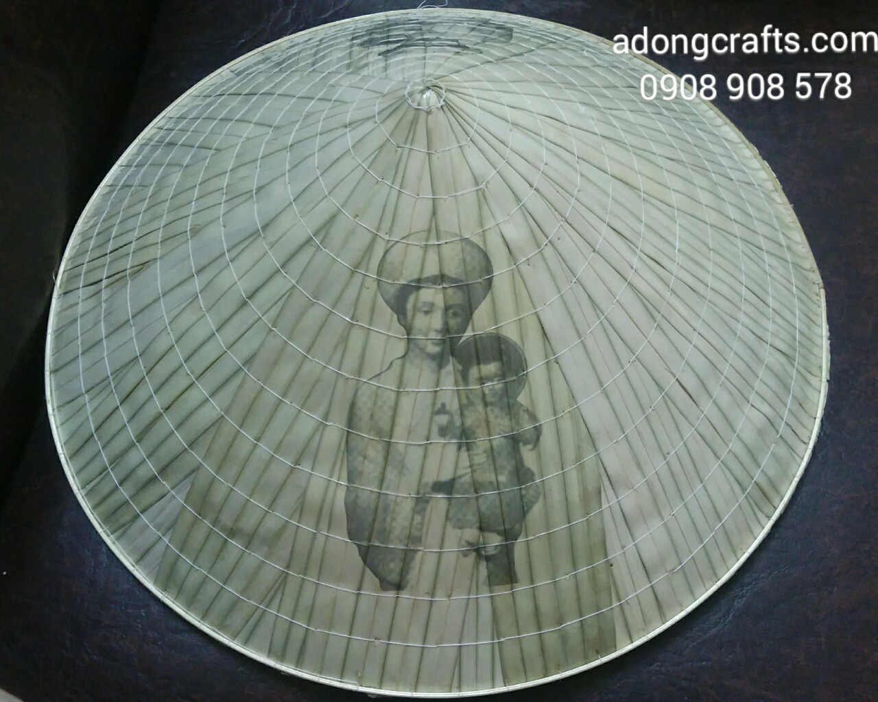 non la in hinh duc me lavang qua tang viet kieu