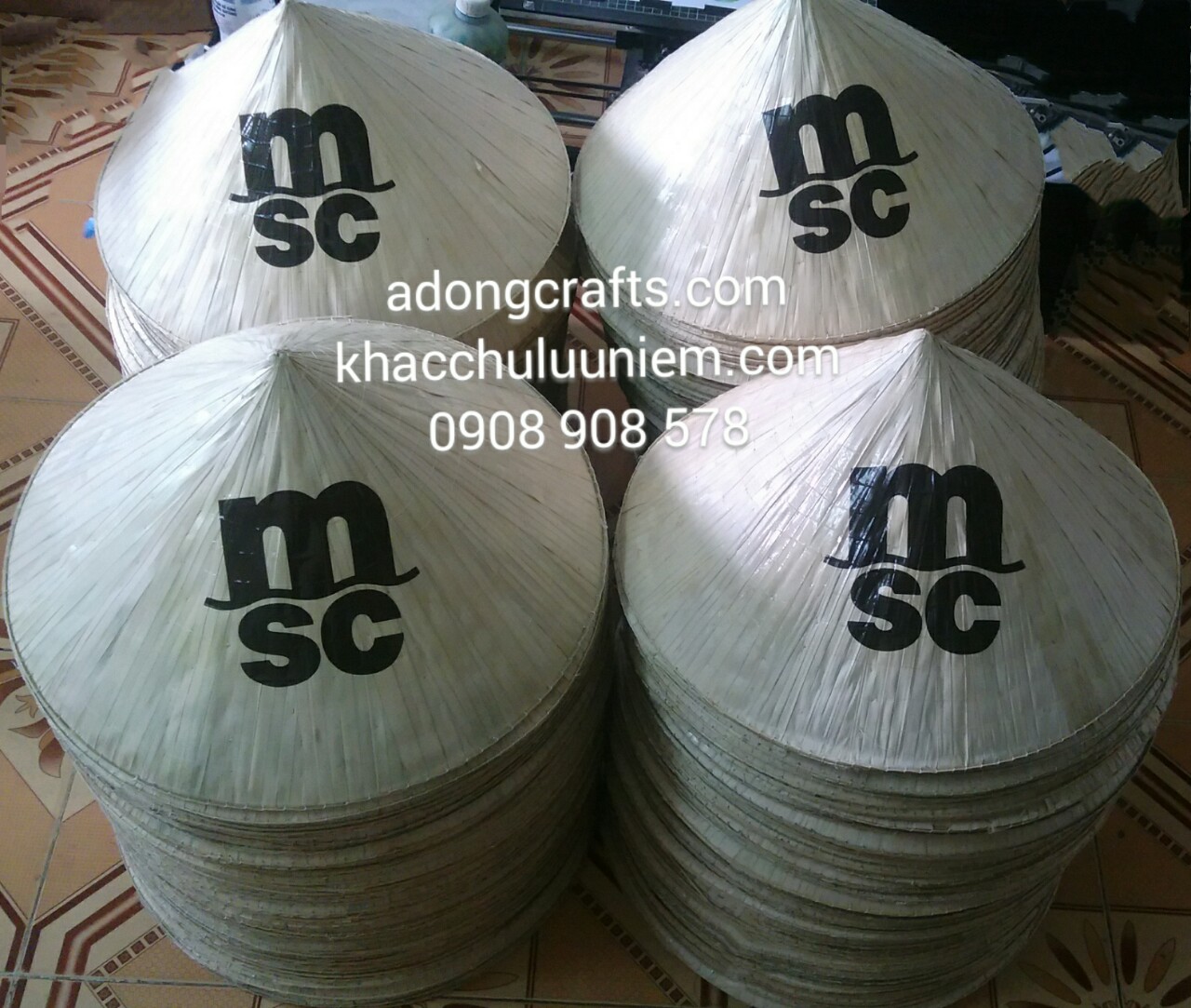 non la in logo thuong hieu cong ty du lich, du kich co, in non la o dau