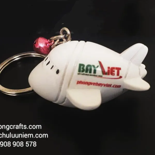 Móc chìa khóa máy bay trắng in logo Phòng vé máy bay