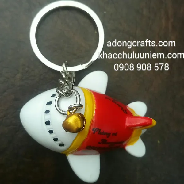 Móc khóa các hãng máy bay in logo, tên số điện thoại... các phòng vé theo yêu cầu