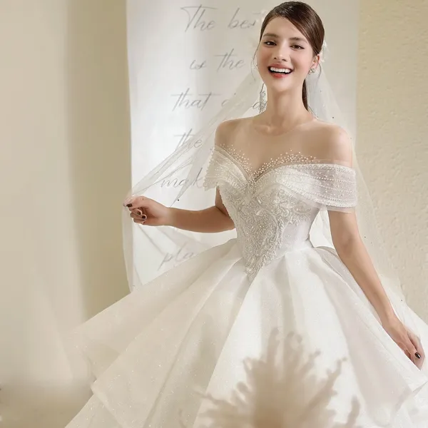 VÁY CƯỚI LÀM LỄ TRỄ VAI ĐÍNH KẾT LẤP LÁNH