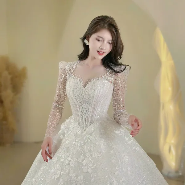 VÁY CƯỚI LÀM LỄ TAY DÀI KẾT HOA