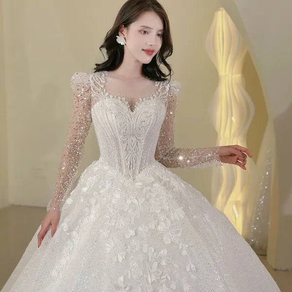 VÁY CƯỚI LÀM LỄ TAY DÀI KẾT HOA
