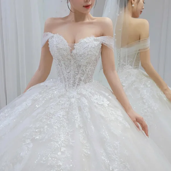 VÁY CƯỚI LÀM LỄ TRỄ VAI LỘNG LẪY