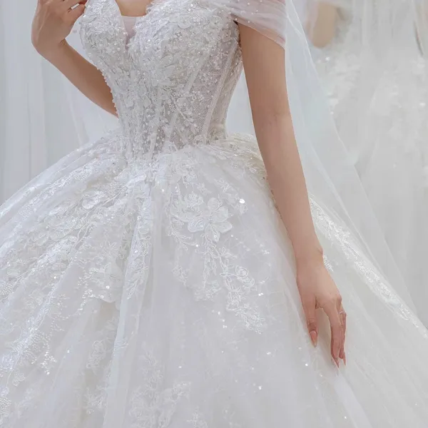 VÁY CƯỚI LÀM LỄ TRỄ VAI LỘNG LẪY