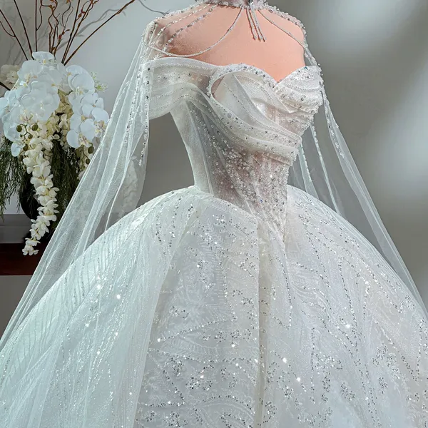 VÁY LỄ TRỄ VAI DỆT KIM SA LẤP LÁNH KÈM ÁO CHOÀNG