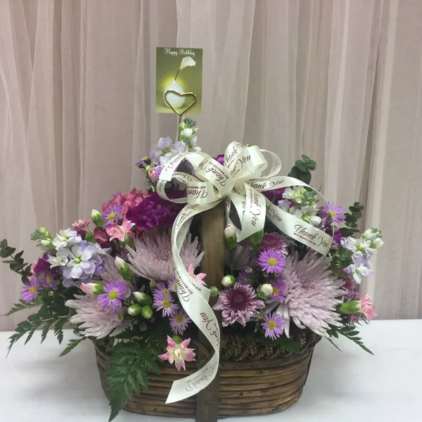 Giỏ hoa hồng tím