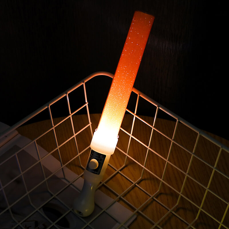 Gậy led cổ vũ kim tuyến cam 25cm Gậy led cổ vũ kim tuyến cam 25cm